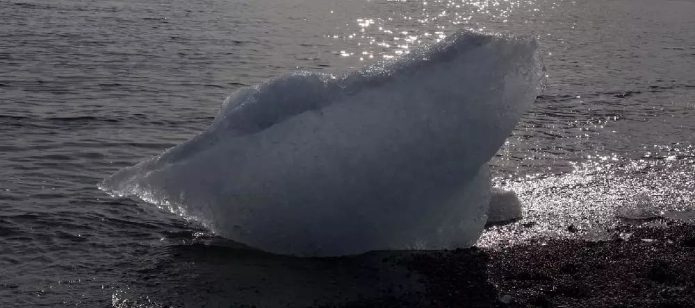 A large chunk of ice floating in the sea