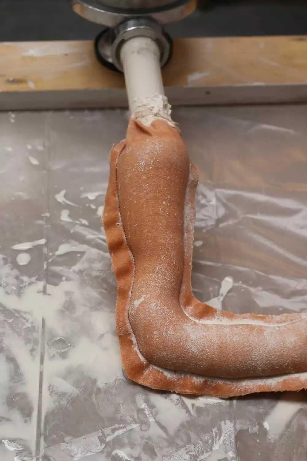 Milk being squeezed into a mould